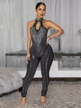 Sparkling Rhinestone Cutout Jumpsuit in black from D'Journé Fashion, model wearing front view