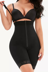 Lace detail zip-up under-bust shaping bodysuit in black from D'Journé Fashion, front view