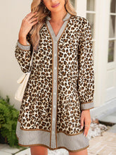 Leopard Print Striped Patchwork Mini Dress by D'Journé Fashion, model wearing loose fit dress front view