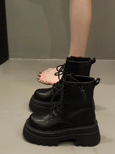 Black lace up platform boots, front angle view
