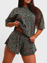 D'Journé Fashion leopard print relaxed fit tee and shorts lounge set in green, front view