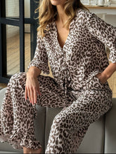 D'Journé Fashion leopard print ruffle-trim top and wide-leg pants lounge set, front view