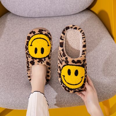 Leopard print smiley face plush slippers from D'Journé Fashion, top view