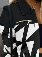 Black button up jacket zip detail close up