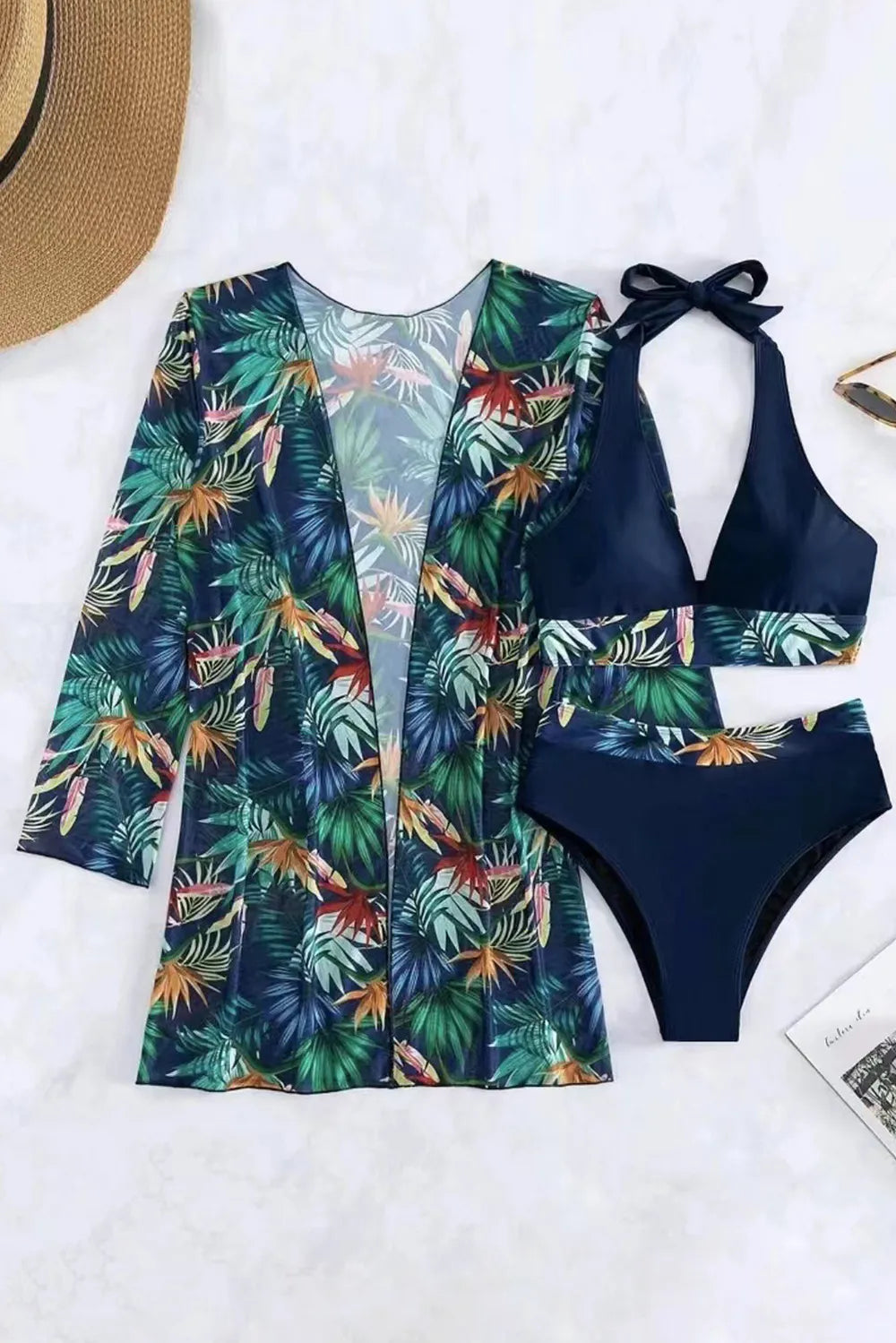 Three-piece swim set back view showing halter neck ties