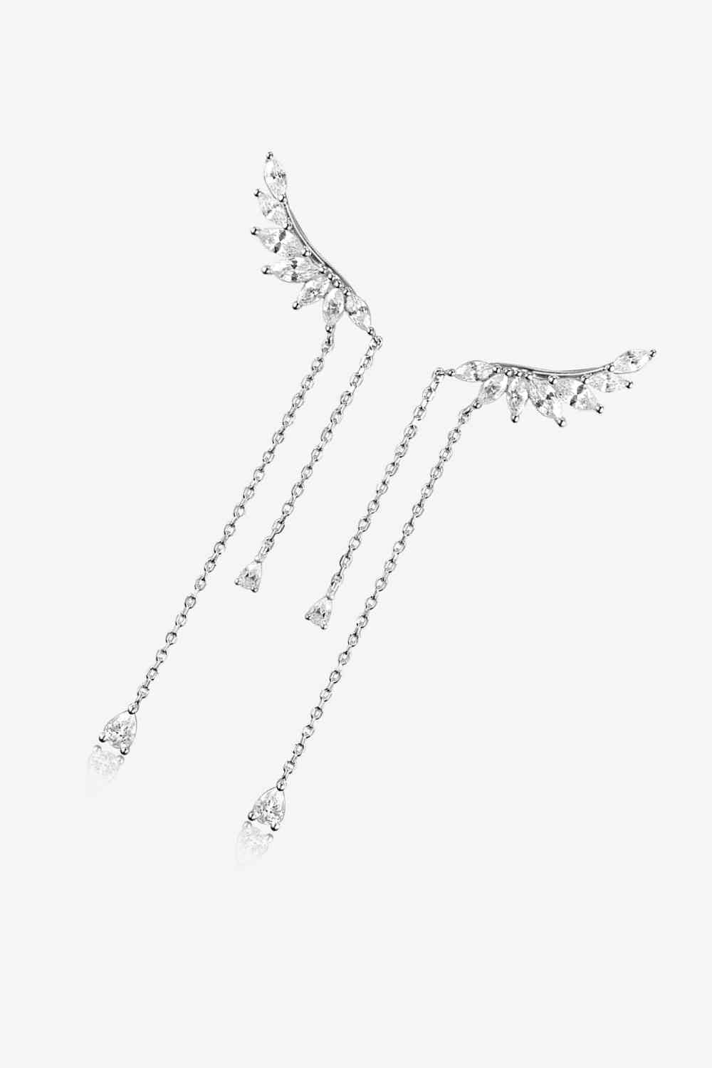 Model wearing platinum-plated silver ear crawler earrings