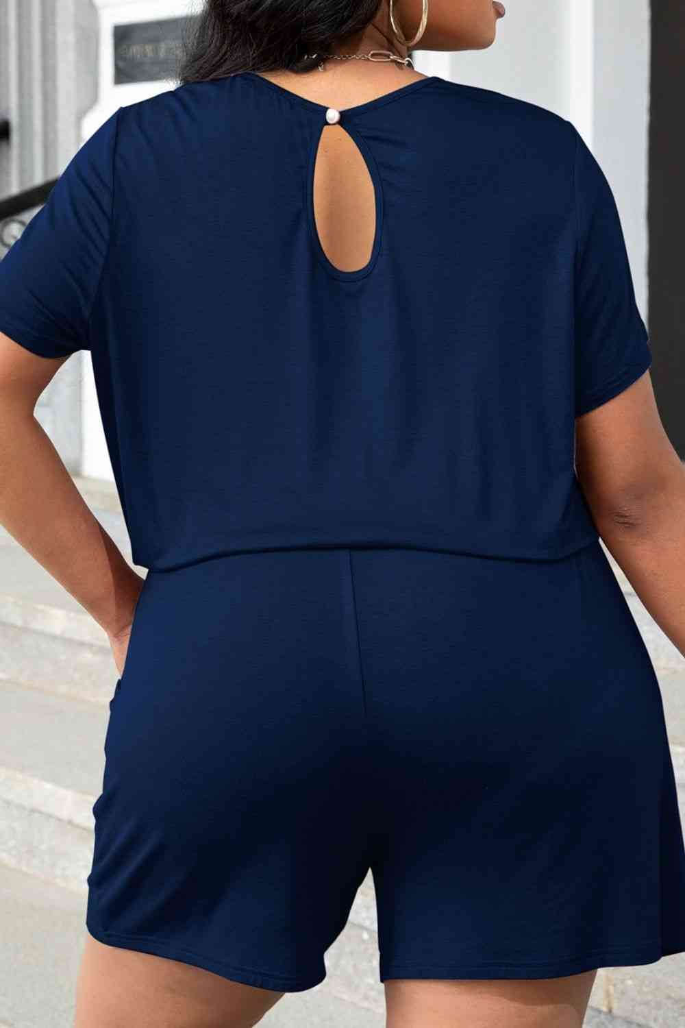 Plus size black drawstring waist romper, side view showing pocket detail