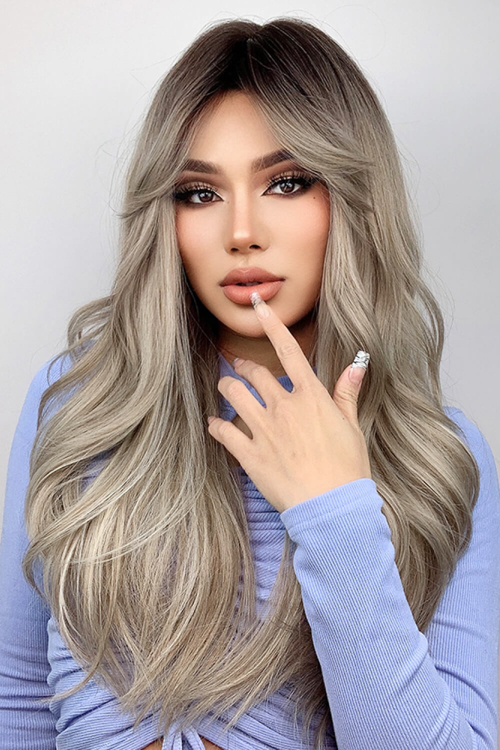 Ash blonde long wave wig full-length view on mannequin