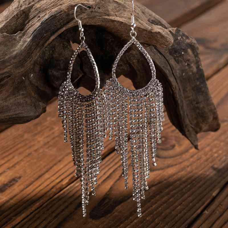 Alloy dangle earrings, angle view showing length