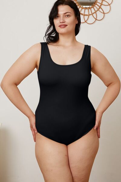 Black square neck bodysuit neckline detail close up
