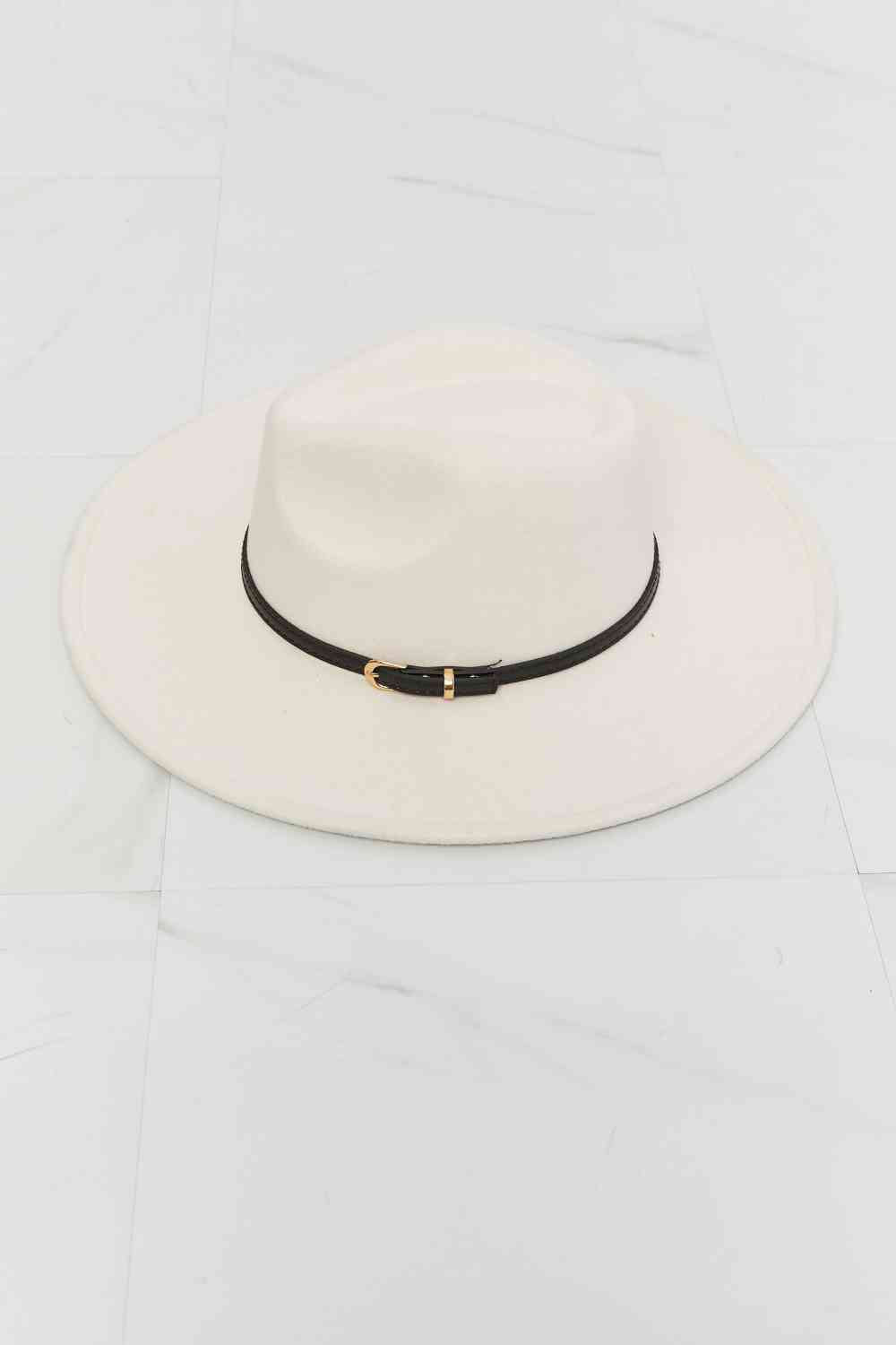 Beige fedora hat showing wide brim shape, top view
