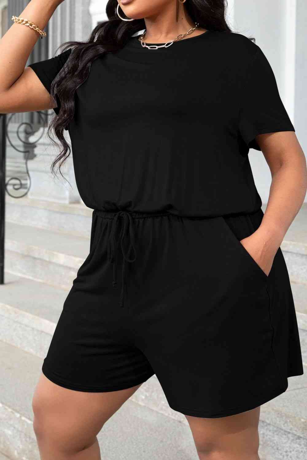Plus size navy drawstring waist romper with pockets, front view