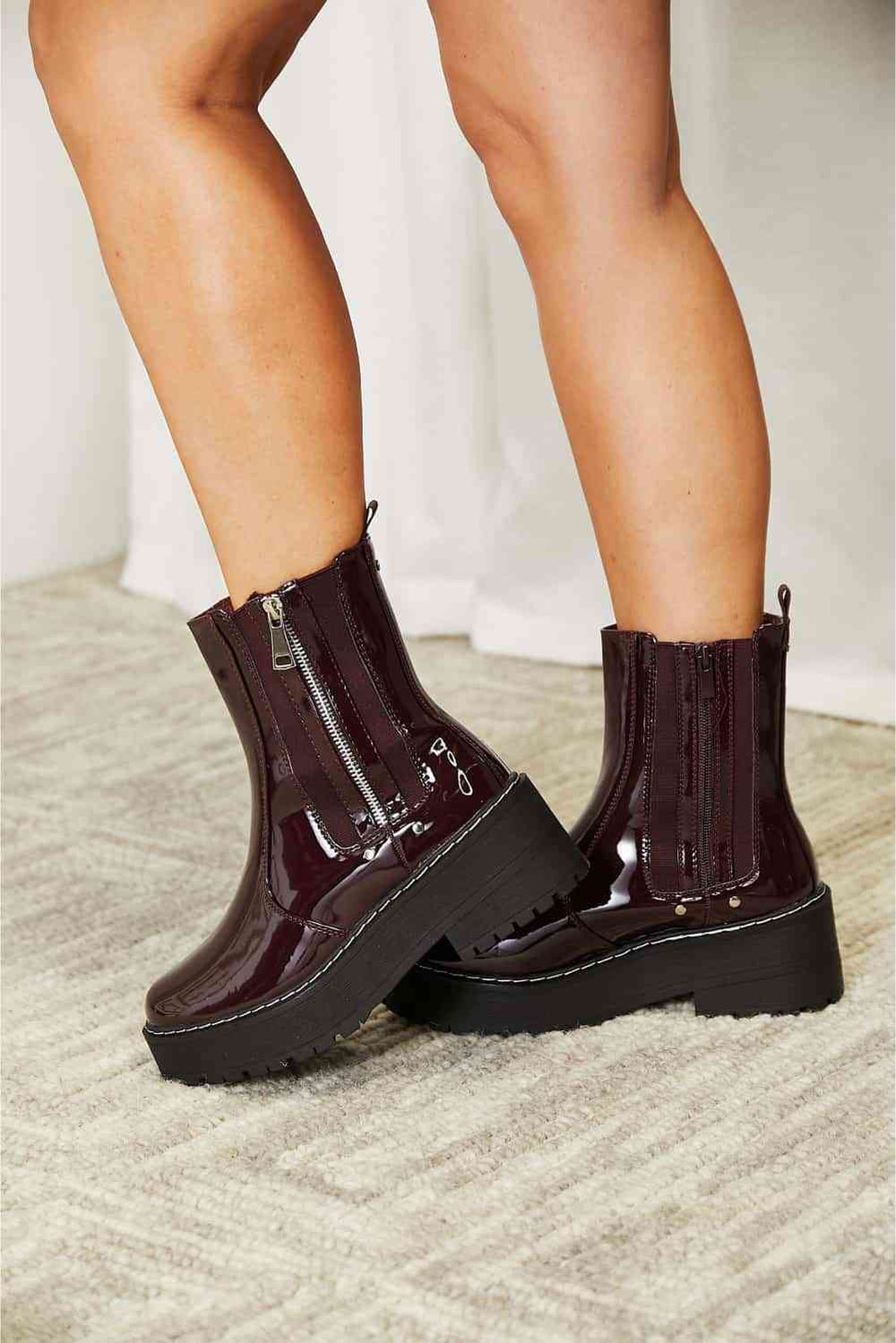 Wine side zip platform boots, side profile with zipper detail