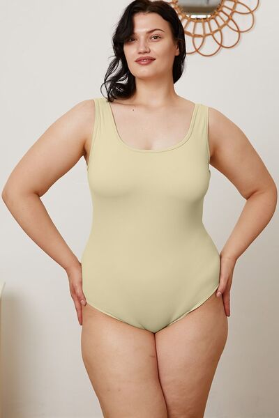 Beige square neck bodysuit neckline detail close up