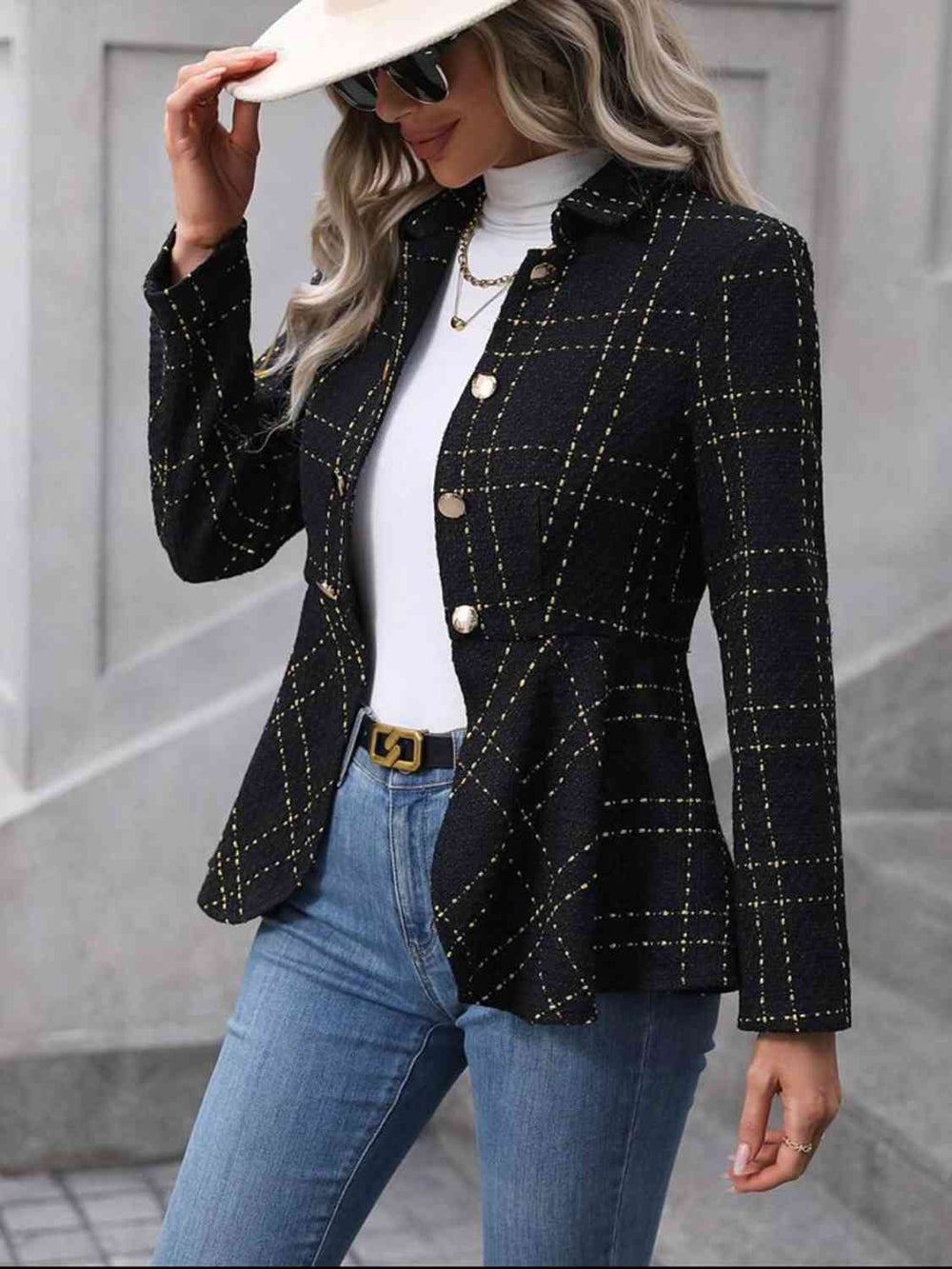 Black ruffle hem blazer, side view on model