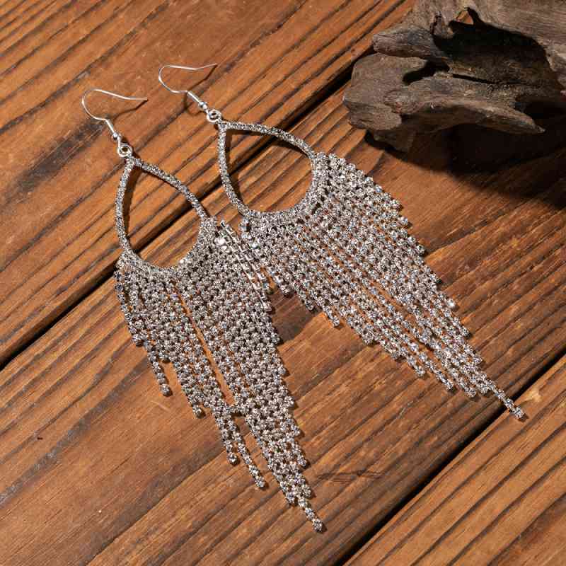 Alloy dangle drop earrings, pair displayed flat