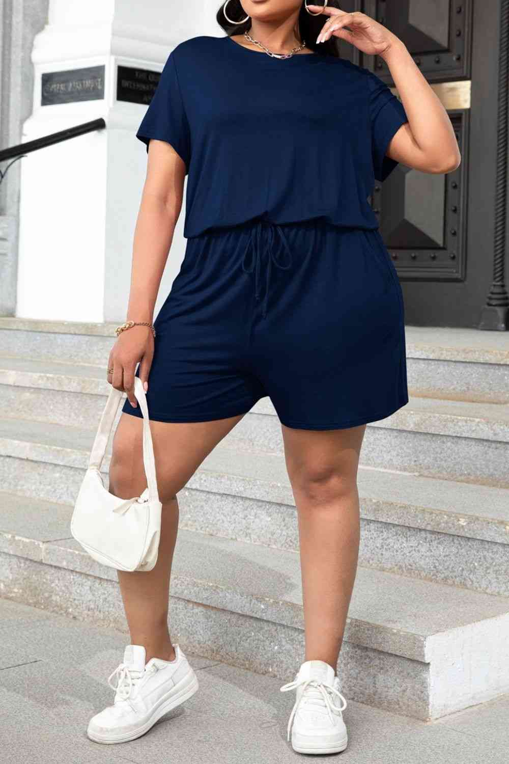 Plus size black romper, back view with drawstring waist