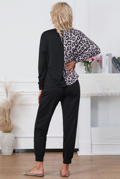 Black leopard print lounge top and pants set, model side view
