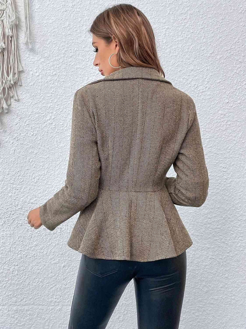 Tan ruffle hem blazer, side view on model
