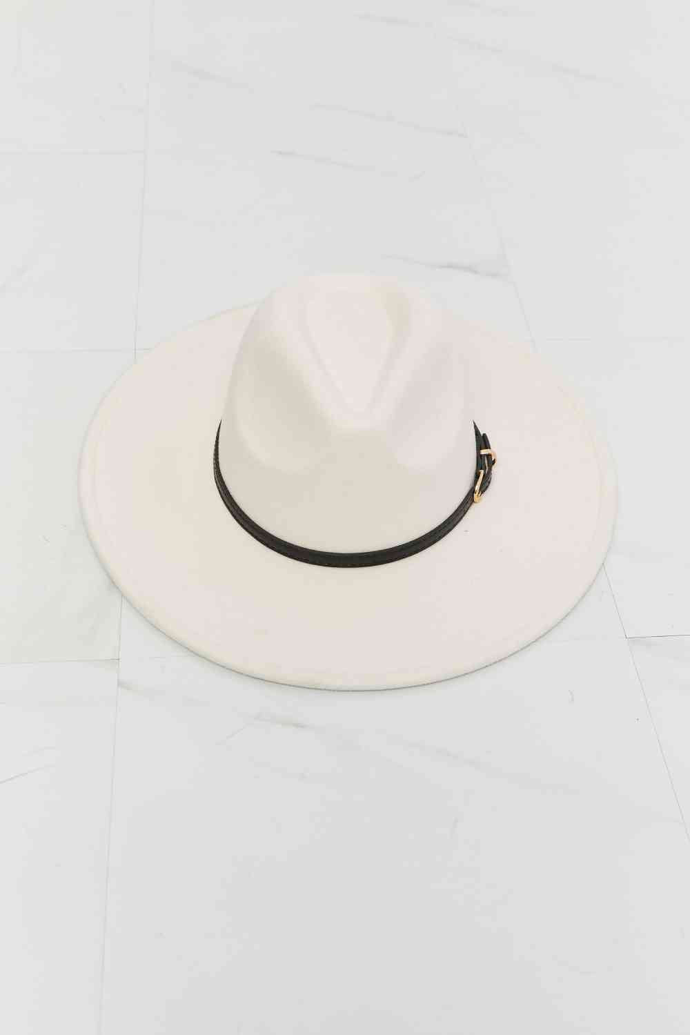 Beige fedora hat styled as a classic year-round accessory