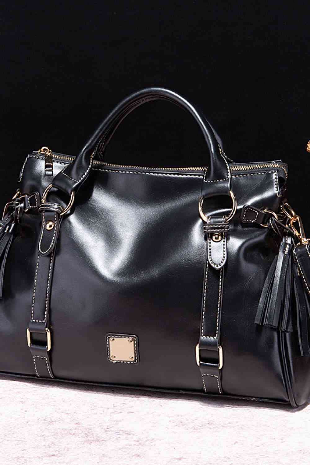 Pastel blue PU leather tassel handbag, front view