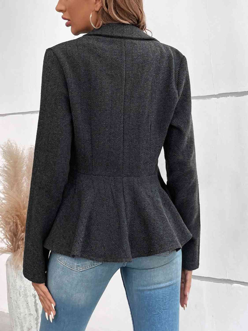 Charcoal ruffle hem blazer, side view on model