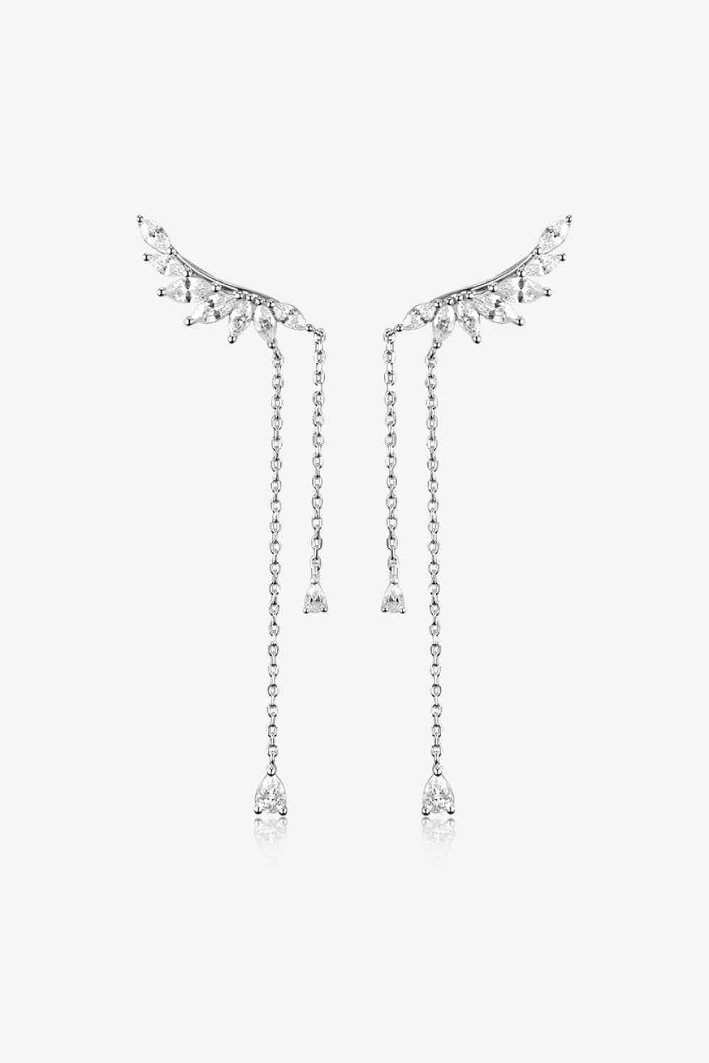 Close-up of sleek modern design on platinum-plated crawl earrings