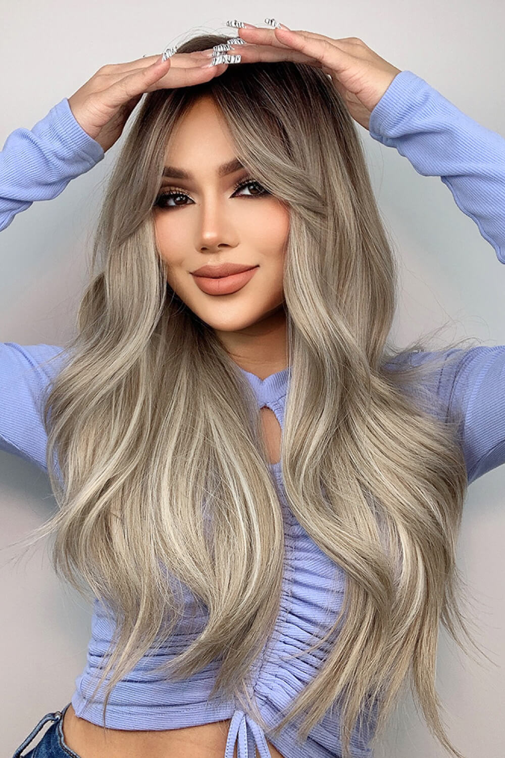 Wave texture close-up on ash blonde synthetic wig
