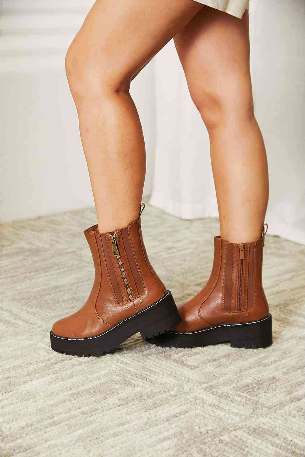 Brown side zip platform boot, front angle view
