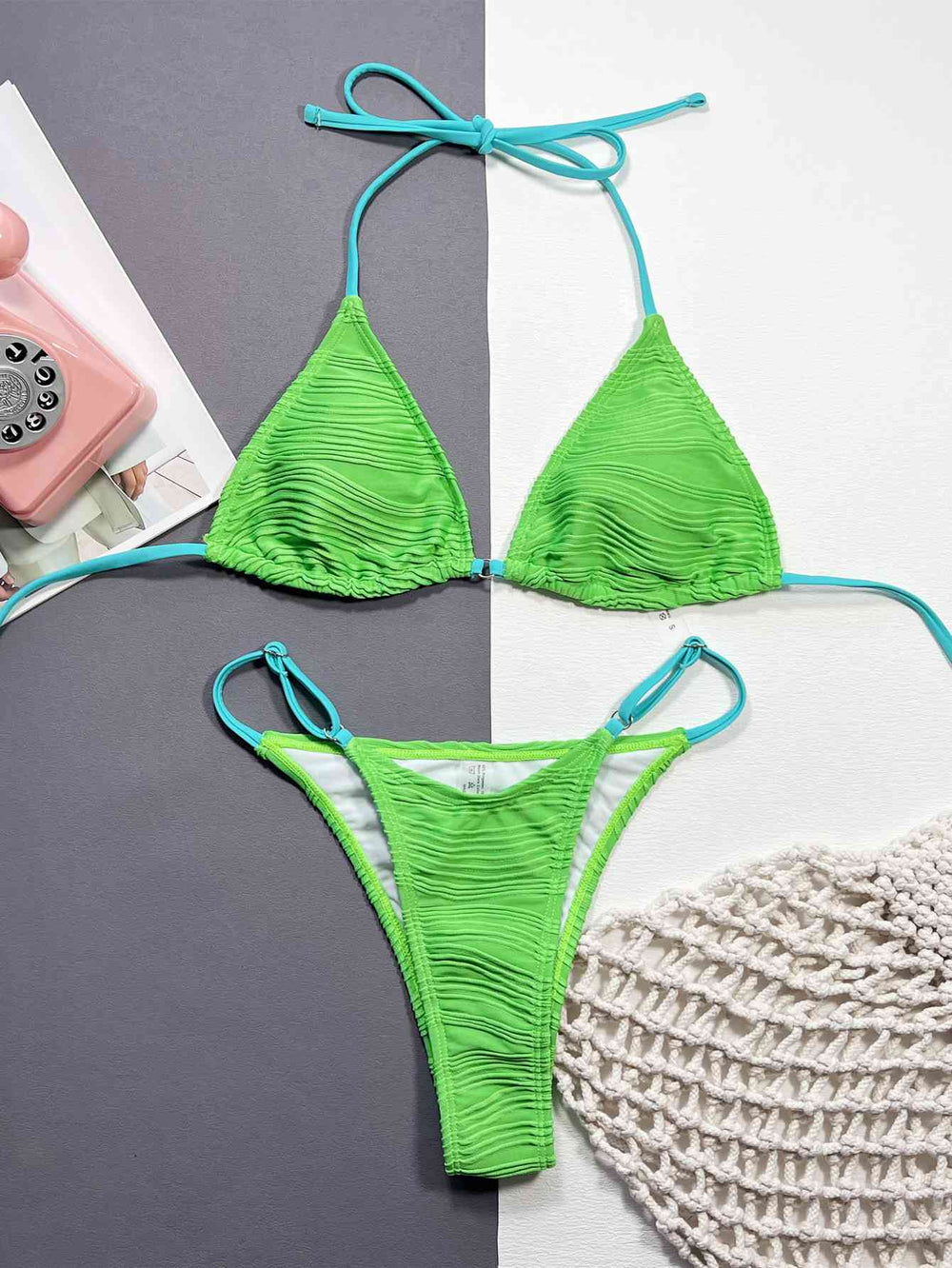 Mint green halter bikini top close up of ribbed fabric